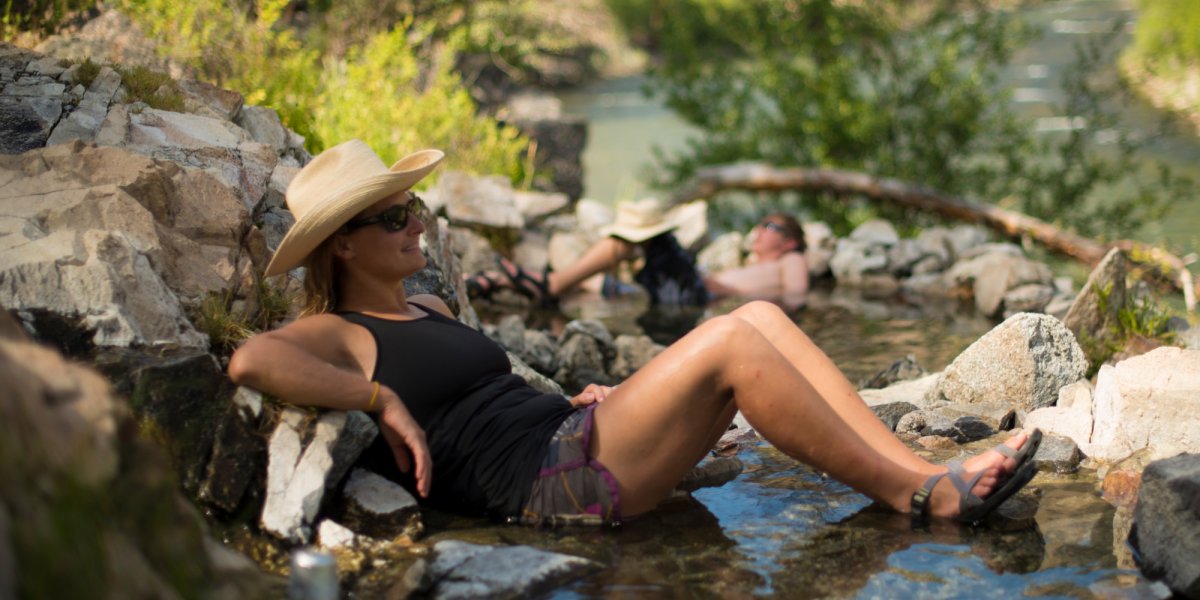 woman lounging in the river