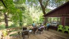 Guests enjoying the view from the porch at Marial Lodge, Oregon