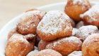 fried doughnut balls with powder sugar