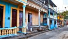 Old colorful buildings on a street in Cuba
