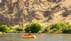 yellow cargo raft on the deschutes river
