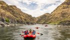 Outfitted multi-day rafting trip through Hells Canyon Snake River on a sunny day