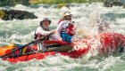Red raft in splashy whitewater on the Deschutes River