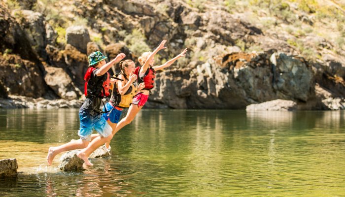 kids jumping into the snake river